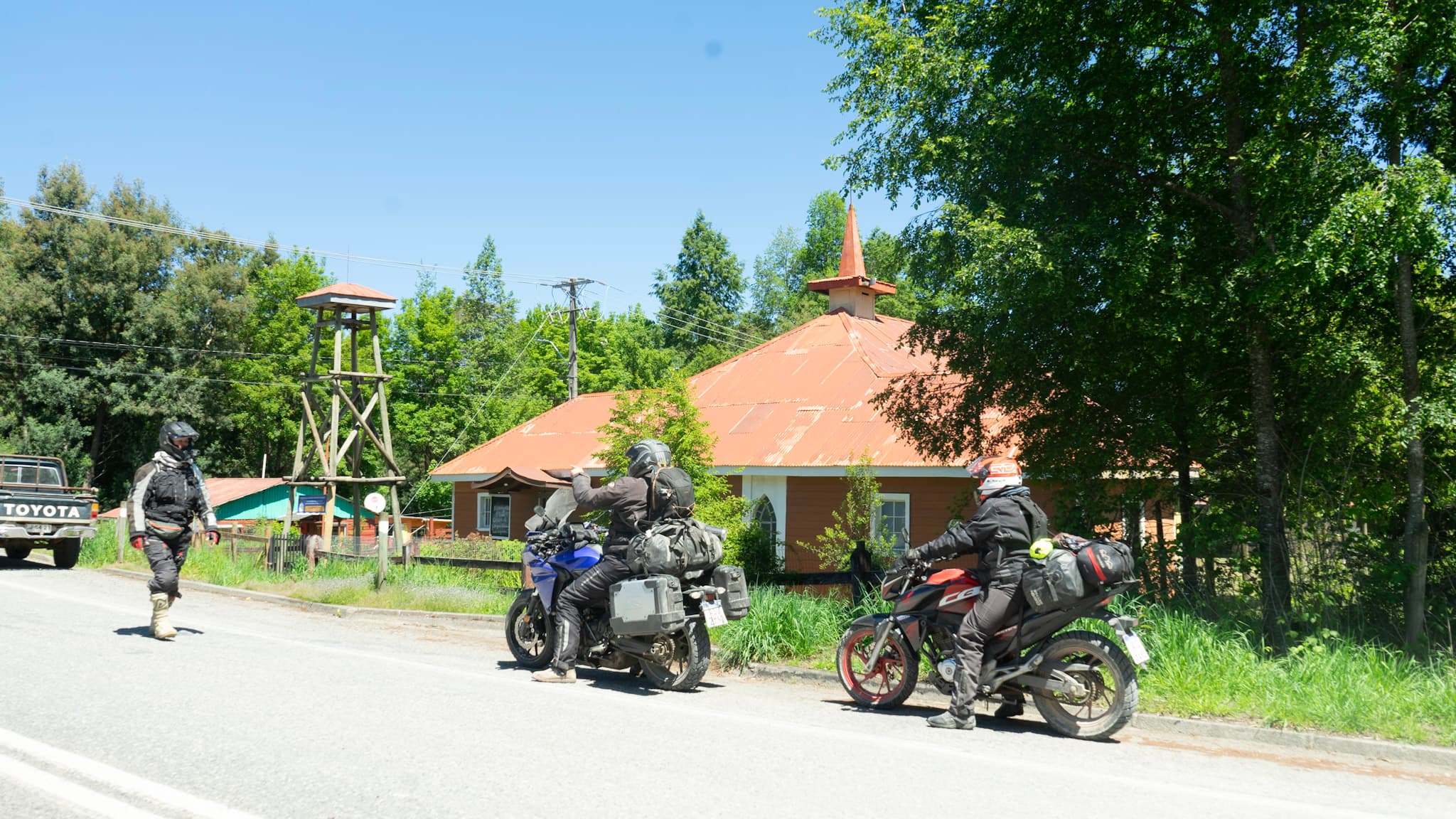 Motorcycles moving along a Patagonian route during Cruces del Sur scouting.