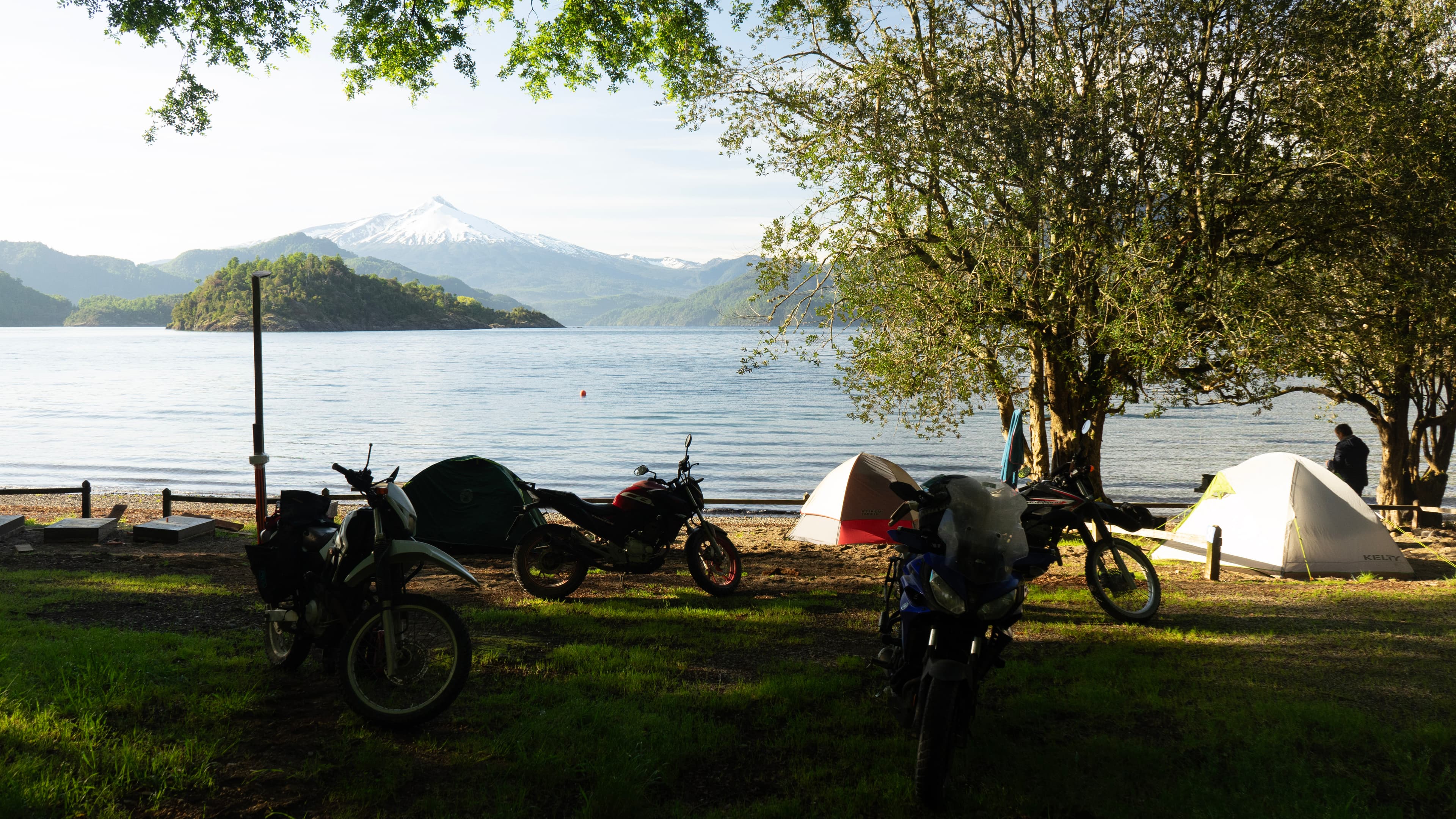 Motorcycle camp beside a Patagonian lake.
